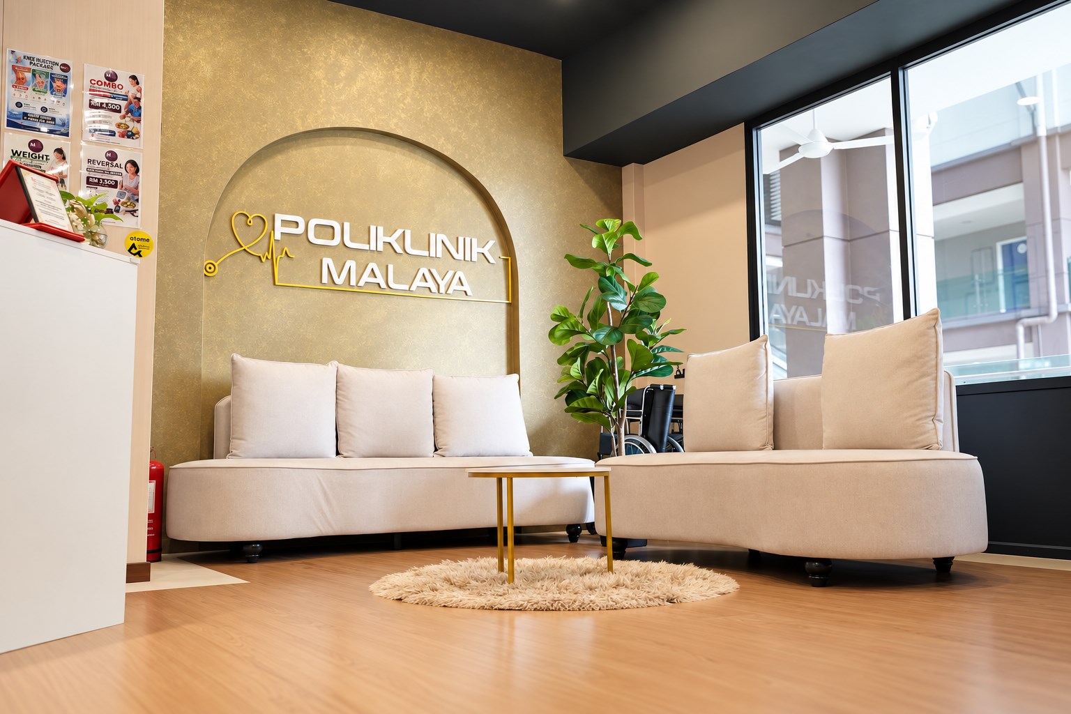 The lounge and Poliklinik Malaya wall sign