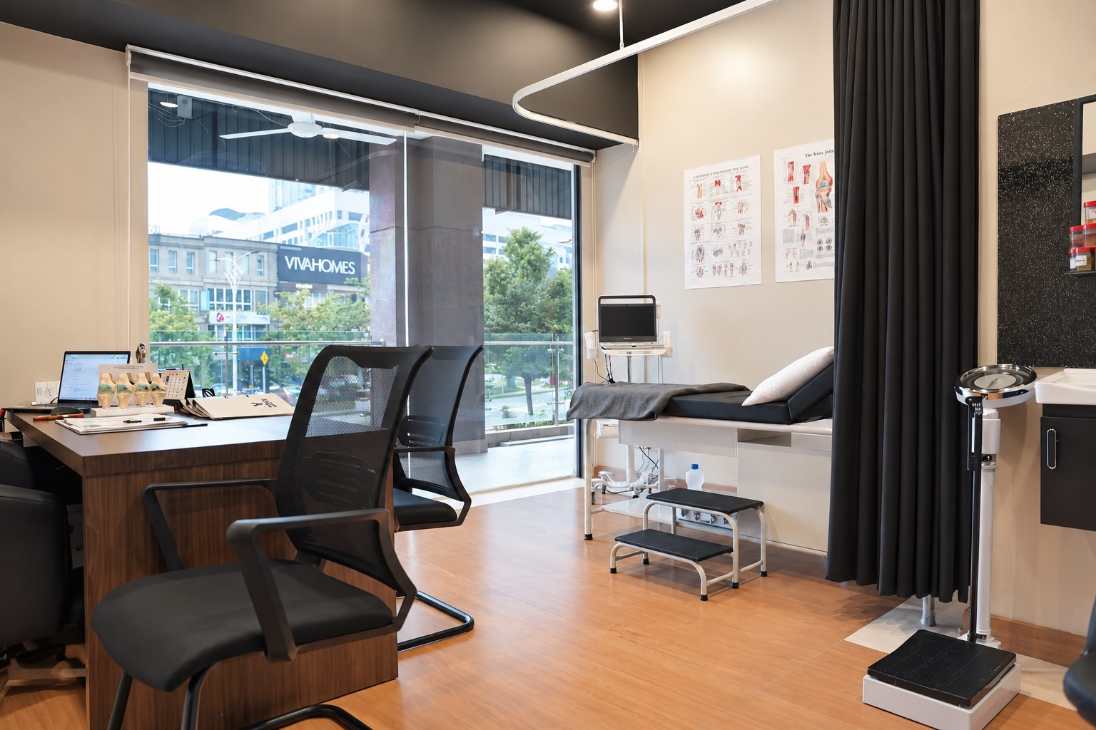A consultation and examination room at Poliklinik Malaya